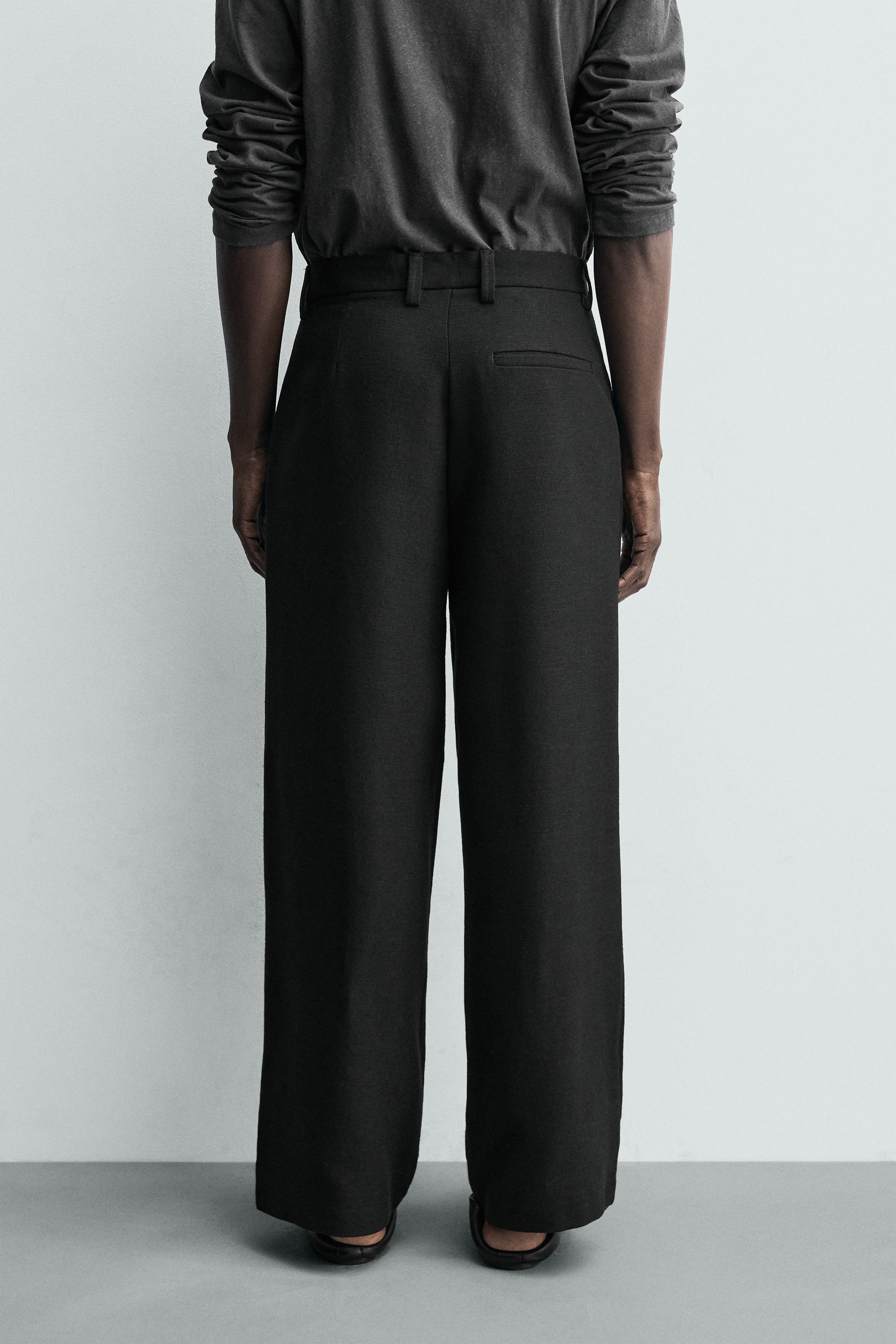PLEATED RELAXED FIT PANTS